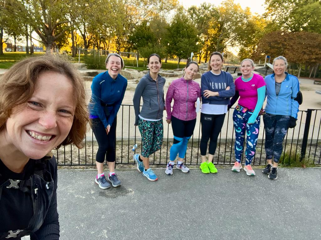 Smiling women in trainers and lycra